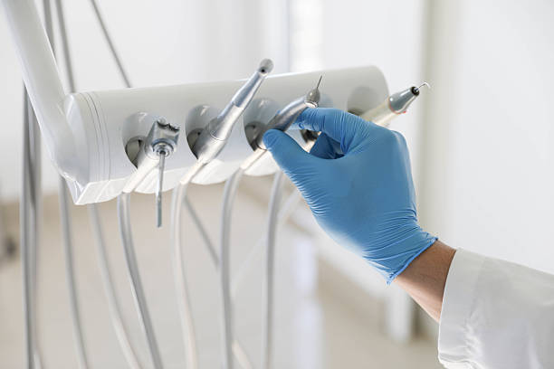 Professional Tooth Extraction technician working in Johnson City, KS